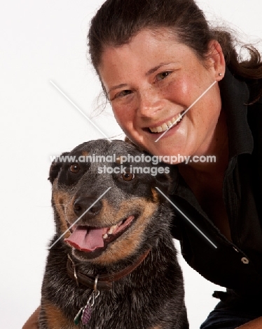 woman with Australian Cattle Dog smiling at camera