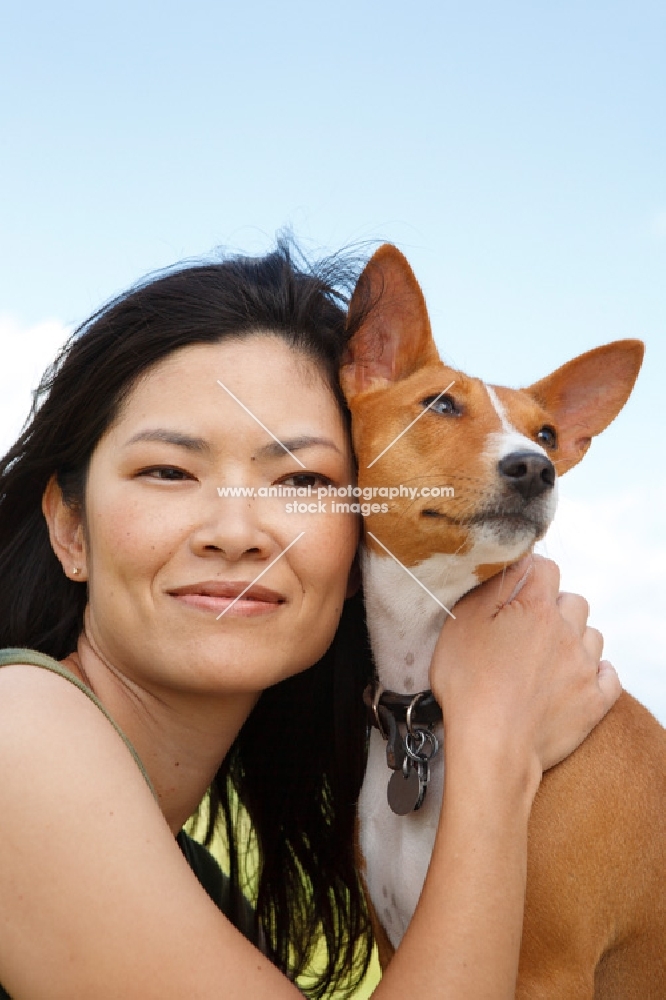 woman and her basenji