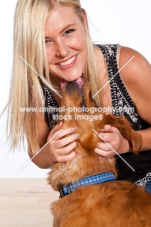 woman and her golden retriever