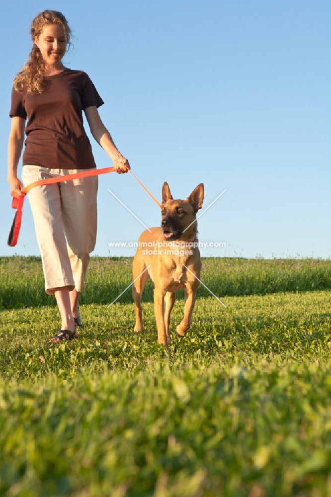 woman walking with dog