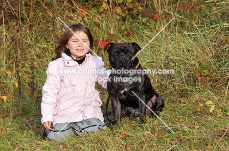 girl with Staffordshire Bull Terrier