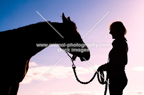 Silhouette of Arabian standing with woman