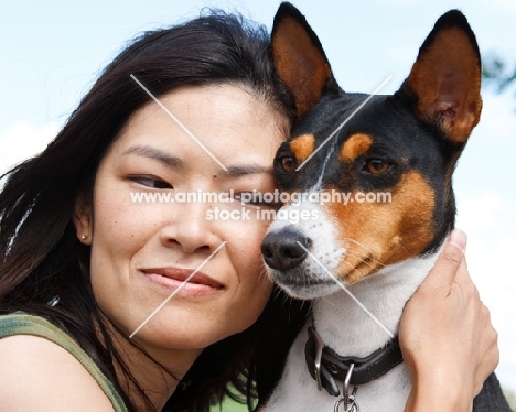 woman and her basenji