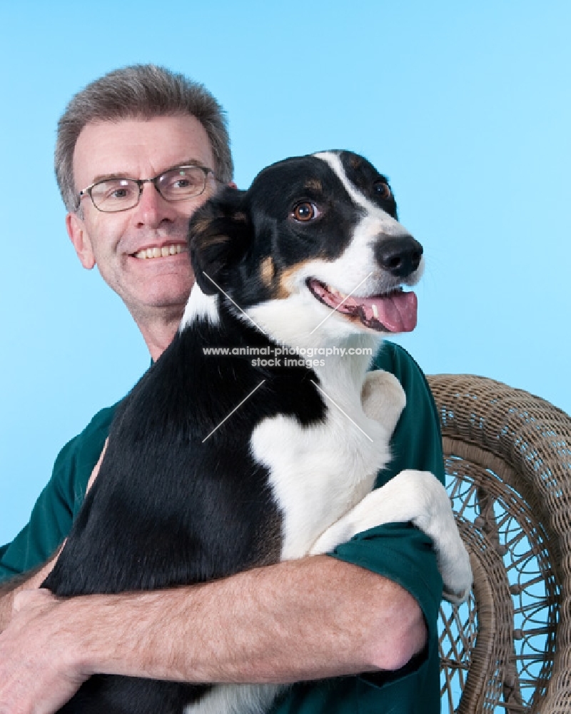 man with border collie