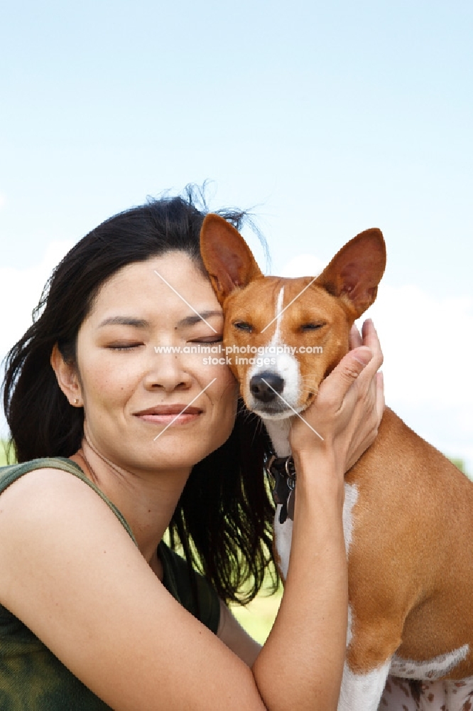 woman and her basenji