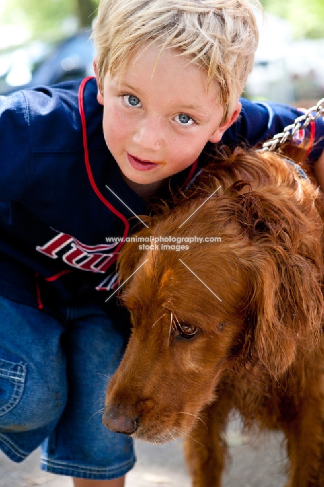 Golden retriever with boy