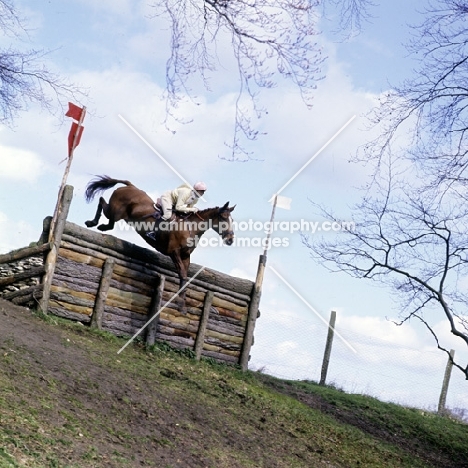 jumping a drop fence at badminton 1972