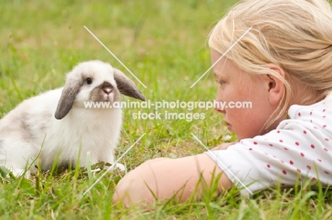 girl with mini lop rabbit