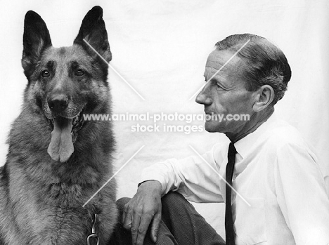 Stanley Dangerfield admiring a german shepherd dog