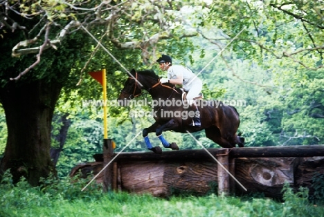 mark phillips riding the cross country course at windsor horse trials