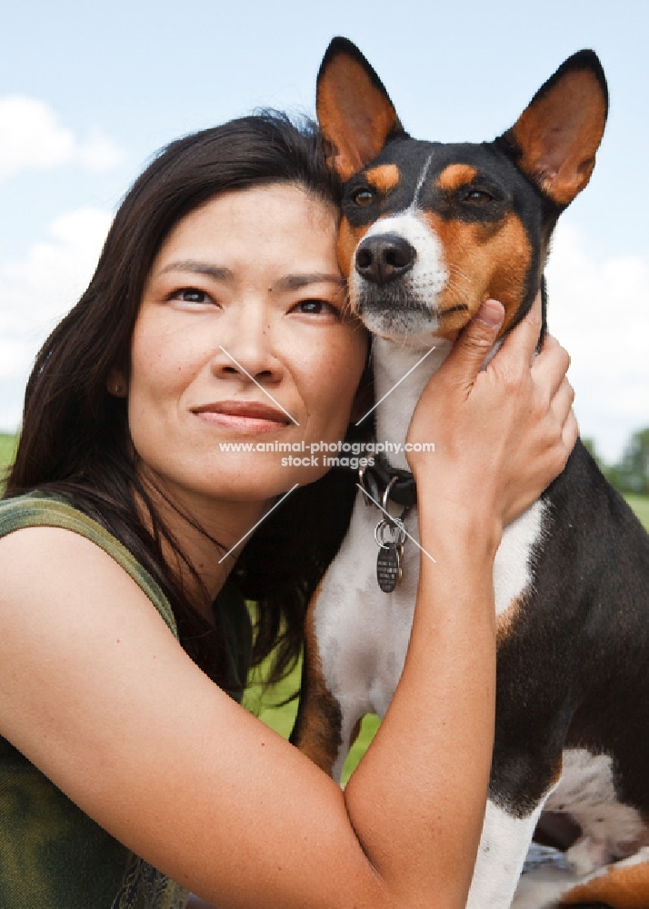 woman and her basenji