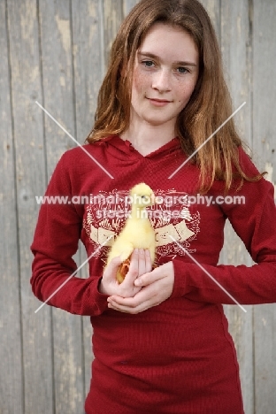 Girl with Embden gosling