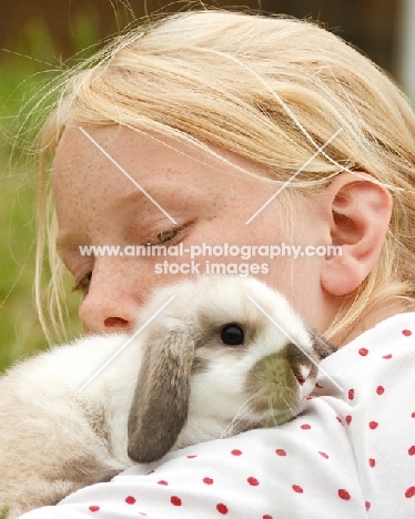 girl holding mini lop