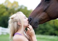 Picture of Appaloosa being kissed