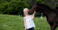 Picture of Appaloosa kissing girl