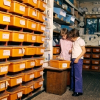 Picture of boy and girl choosing a hamster at percy parslow's hamster farm, 