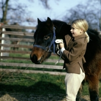 Picture of child with her pony