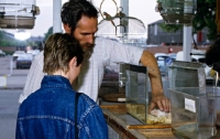 Picture of choosing a hamster in a pet shop