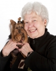 Picture of elderly lady holding a yorkshire terrier