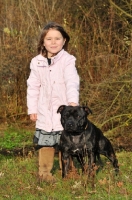 Picture of girl and her Staffordshire Bull Terrier