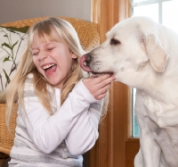 Picture of girl and Labrador