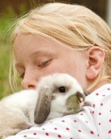 Picture of girl holding mini lop