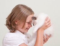 Picture of girl with Ragdoll kitten