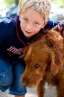 Picture of Golden retriever with boy