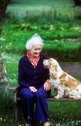 Picture of grey haired lady with her cocker spaniel