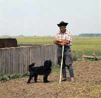 Picture of hungarian puli and owner in hungary