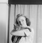 Picture of owner holding her blue cream cat
