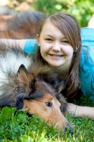 Picture of Rough Collie with girl