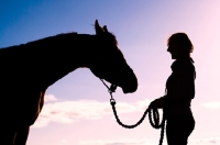 Picture of Silhouette of Arabian standing with woman