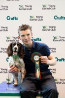 Picture of Springer Spaniel "Chester" and owner Neil Ellis with YKC award for Agility Crufts 2012