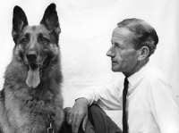 Picture of Stanley Dangerfield admiring a german shepherd dog