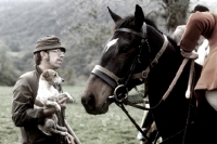 Picture of the terrierman, the vale of aylesbury hunt, with his terrier 