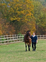 Picture of thoroughbred with woman