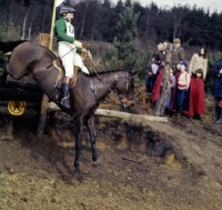 Picture of tweseldown racecourse, crookham horse trials 1975
 novice, landing at drop fence

