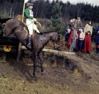 Picture of tweseldown racecourse, crookham horse trials 1975
 novice, landing at drop fence
