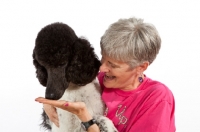 Picture of woman and black and white standard Poodle