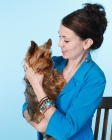 Picture of woman holding a yorkie