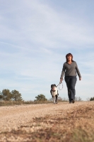 Picture of woman walking her dog