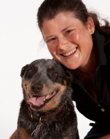 Picture of woman with Australian Cattle Dog smiling at camera
